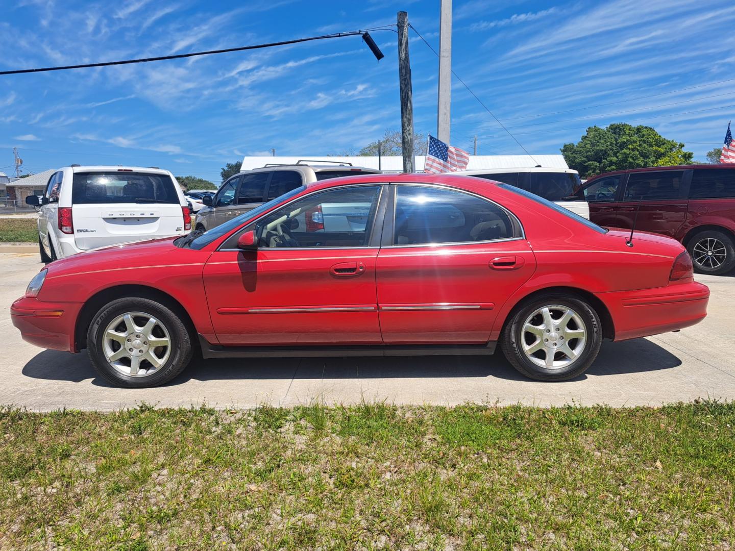 2003 RED /BEIGE Mercury Sable (1MEFM55S43A) , located at 1181 Aurora Rd, Melbourne, FL, 32935, (321) 241-1100, 28.132914, -80.639175 - Photo#0